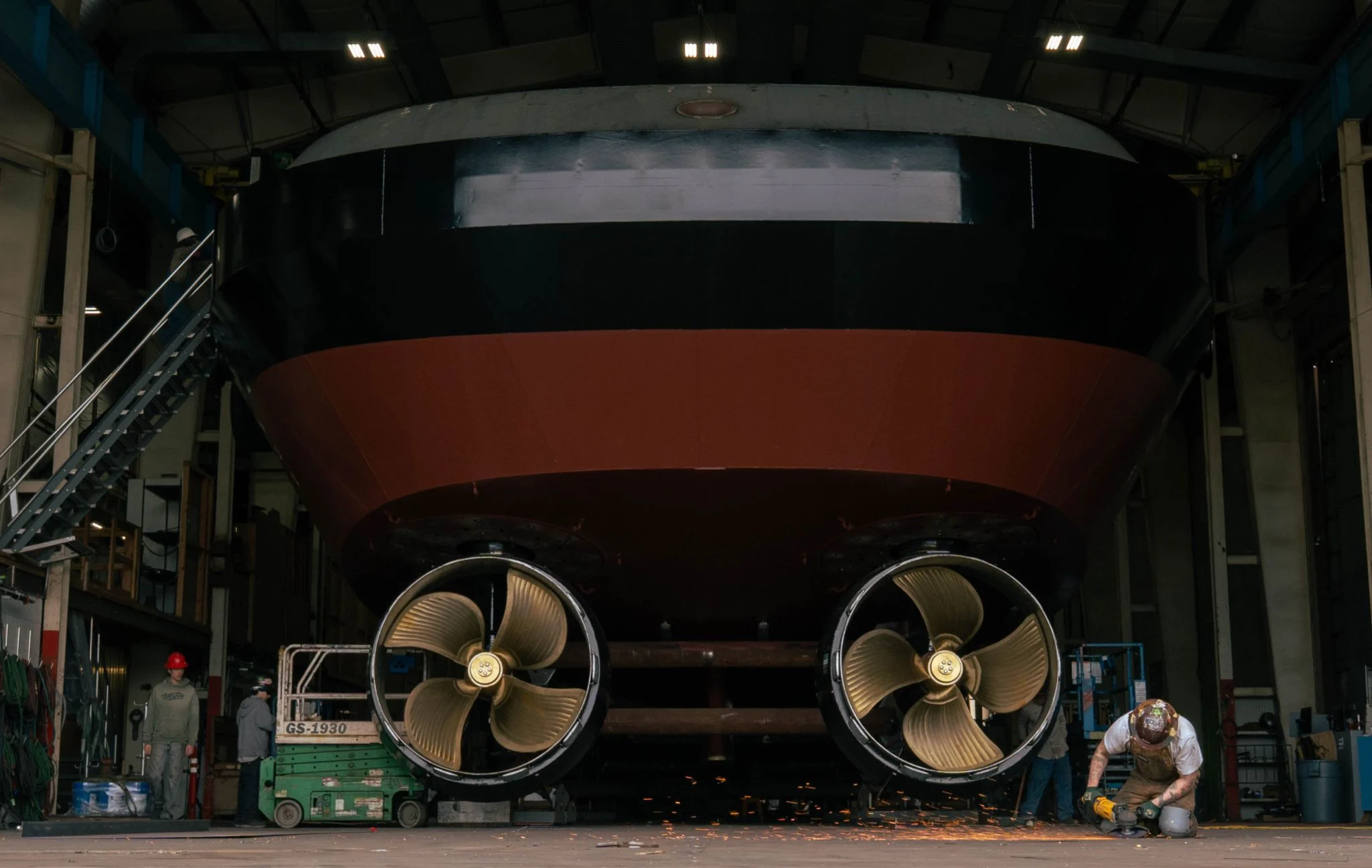 Image of the rear propellers of one of the new electric harbor tugs at Snow & Company's facility in Seattle, Washington